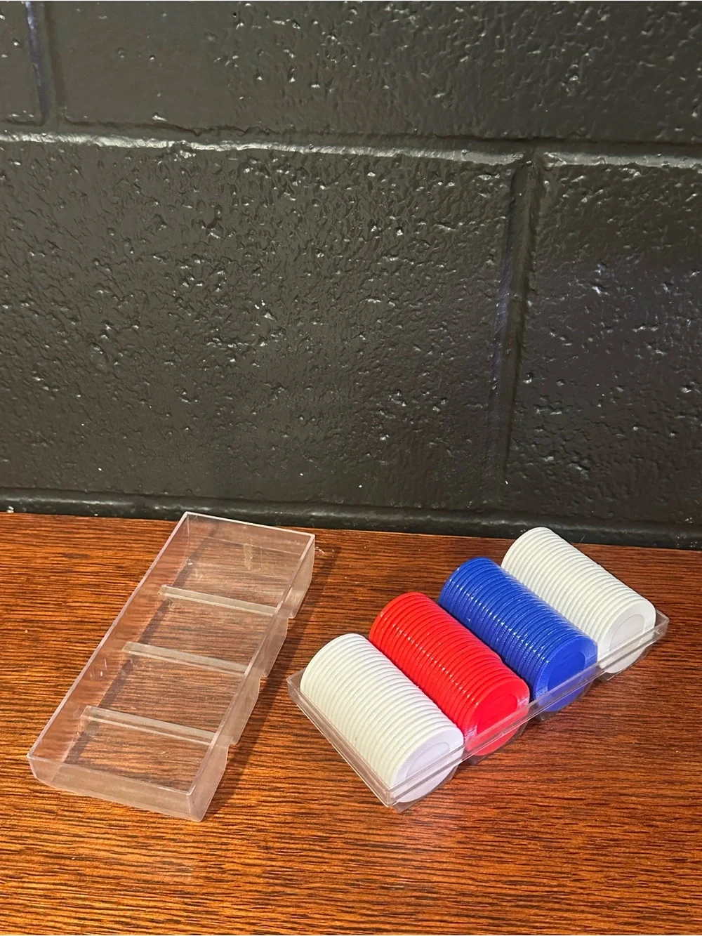 Red, Blue and White Poker Chips in Clear Case